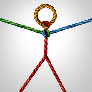 stick figure made of different colors of rope
