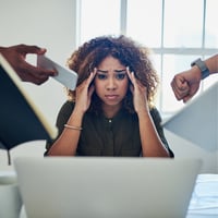 Stressed out woman at laptop