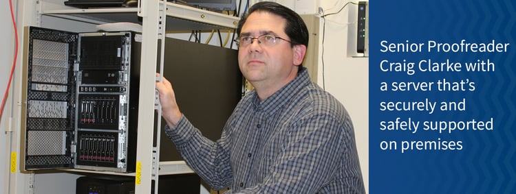 office worker next to server securely supported on-premises